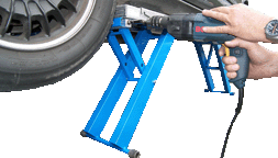 EZcarlift™ operates using a typical electric drill